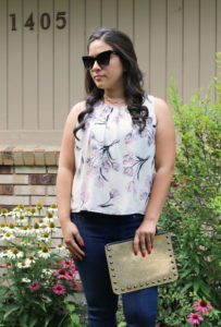 Petite floral blouse from Stitch Fix and a gold studded clutch by Rebecca Minkoff