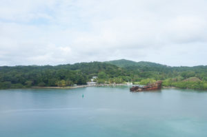 Partially sunken ship in Mahogany Bay, Honduras